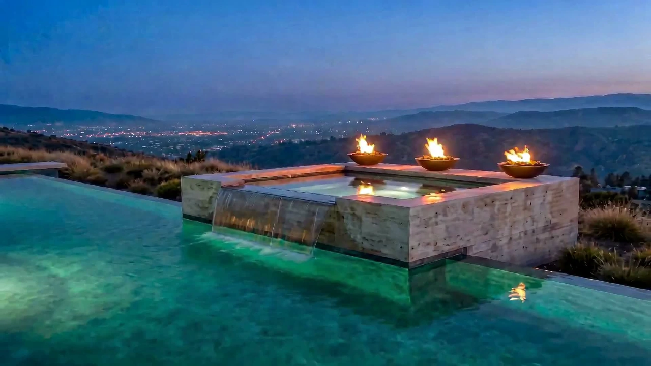 Aerial view of a villa pool in the evening